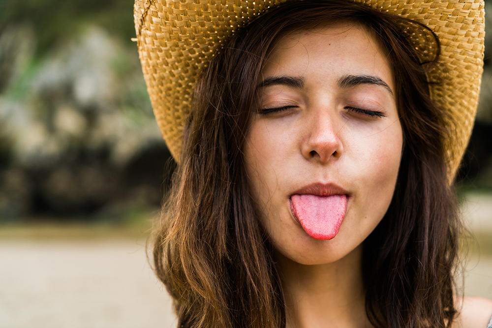 woman sticking out her tongue