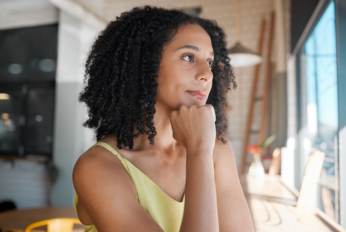woman wondering what causes HS (Hidradenitis Suppurativa)