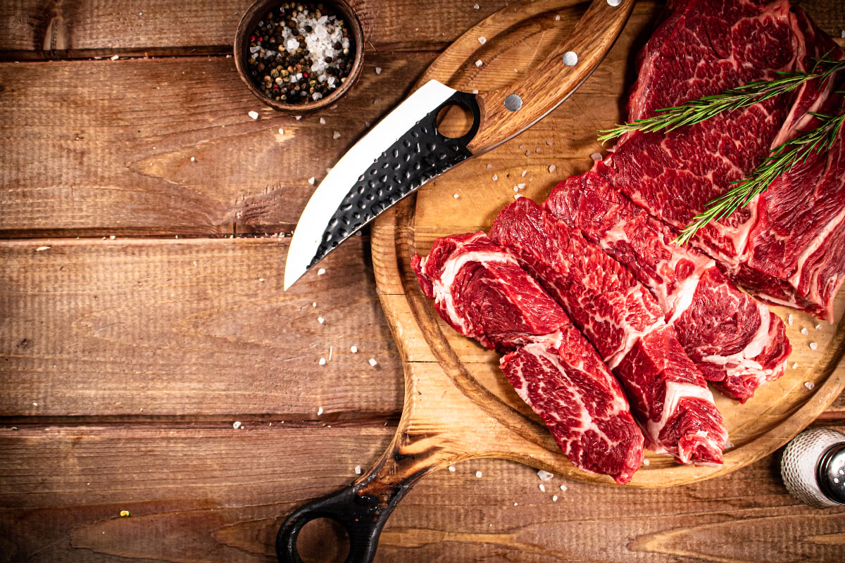 raw beef on cutting board