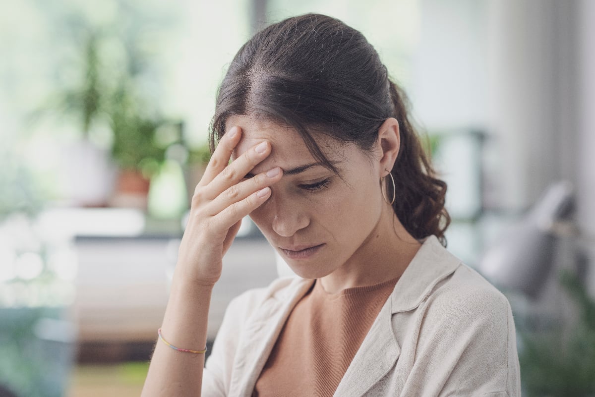 woman with die-off symptoms from taking probiotics
