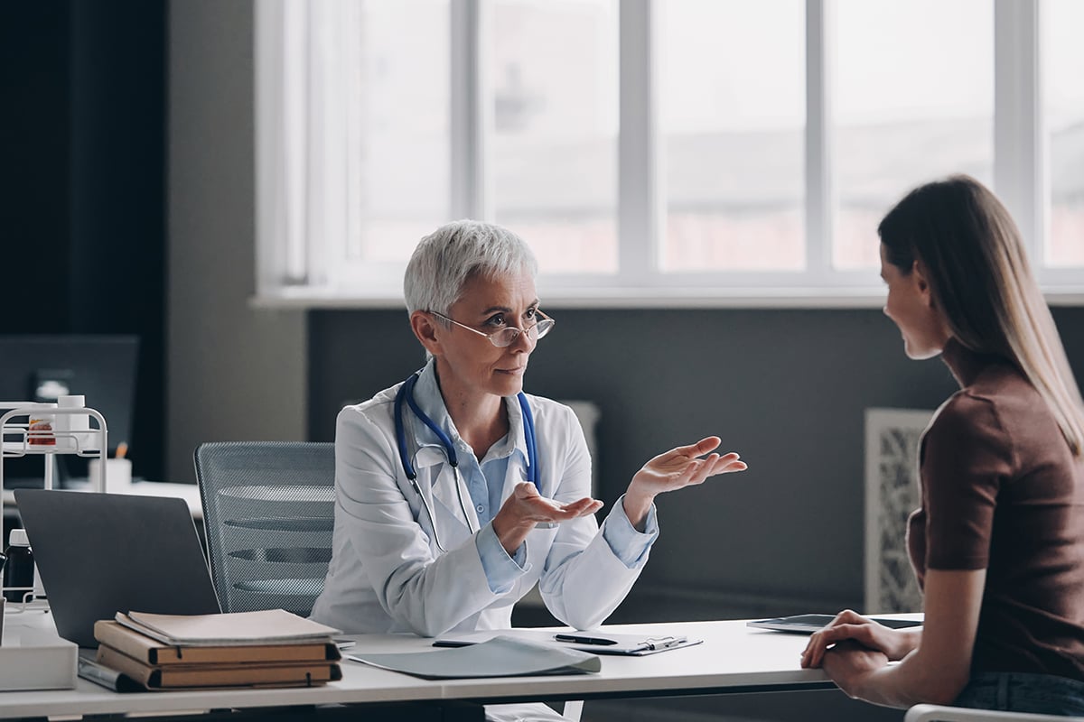 doctor talking with patient about medications