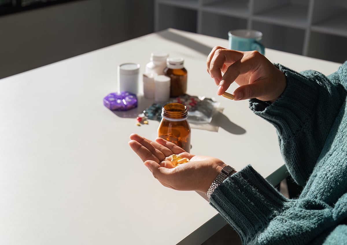 woman taking dupixent medication