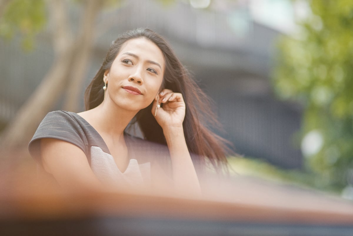 woman thinking about what her symptoms are telling her